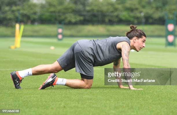 Hector Bellerin of Arsenal warms up during a training session at London Colney on July 4, 2018 in St Albans, England.