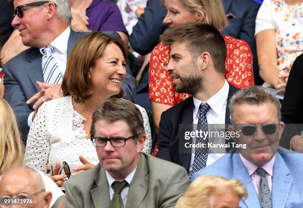 Carole Middleton and Gerard Pique sit in the royal box on day three of the Wimbledon Tennis Championships at the All England Lawn Tennis and Croquet...