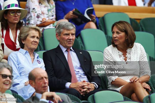 Jane Henman, Michael Middleton and Carole Middleton in the stands on Centre Court on day three of the Wimbledon Lawn Tennis Championships at All...