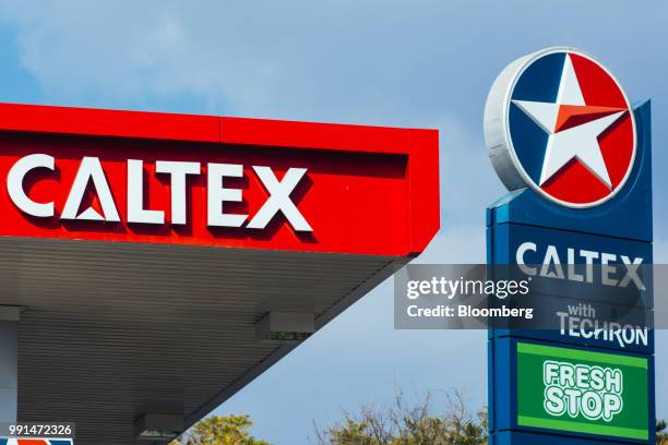Company logo hangs on the roof of a Caltex gas station, operated by Chevron Corp., in Pretoria, South Africa, on Wednesday, July 4, 2018. Glencore...