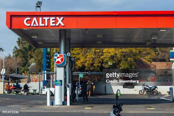Company logo hangs on the roof of a Caltex gas station, operated by Chevron Corp., in Pretoria, South Africa, on Wednesday, July 4, 2018. Glencore...