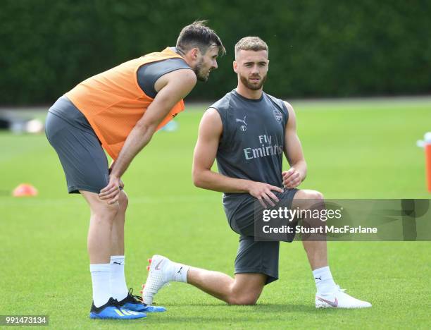 Carl Jenkinson and Calum Chambers of Arsenal during a training session at London Colney on July 4, 2018 in St Albans, England.