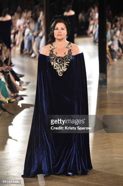 Actress Anna Netrebko opens the Yanina Couture Haute Couture Fall Winter 2018/2019 show as part of Paris Fashion Week on July 3, 2018 in Paris,...