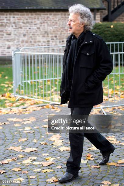 Singer Wolfgang Niedecken arrives at the mourning ceremony of the departed former soccer player Hans Schaefer in Cologne, Germany, 14 November 2017....