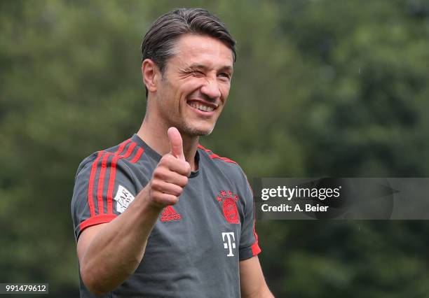 New team coach Niko Kovac of FC Bayern Muenchen gives a thumb up as he arrives for his first training session at the club's Saebener Strasse training...