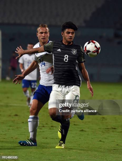 Mahmoud Dahoud of Germany in action against Dan Glazer of Israel during the Under 21 European Qualifying Round 1. Group 5 soccer match between Israel...