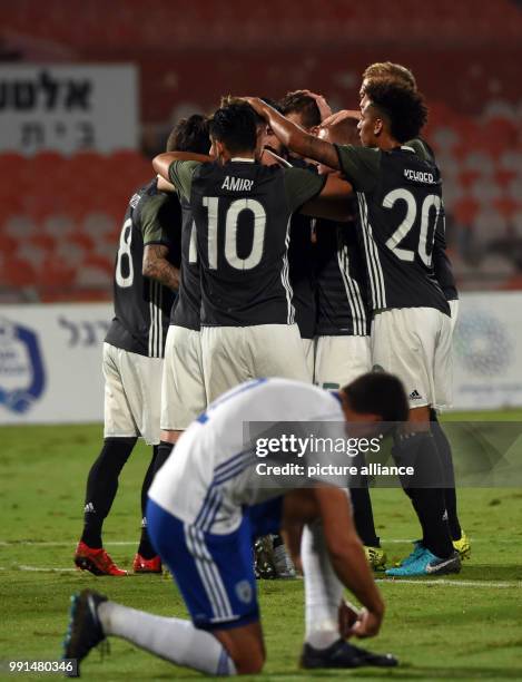 The German team is celebrating the goal during the Under 21 European Qualifying Round 1. Group 5 soccer match between Israel and Germany at the...