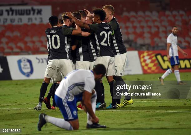 The German team is celebrating the goal during the Under 21 European Qualifying Round 1. Group 5 soccer match between Israel and Germany at the...