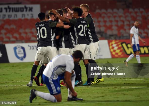The German team is celebrating the goal during the Under 21 European Qualifying Round 1. Group 5 soccer match between Israel and Germany at the...