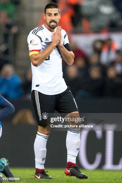 Germany's Sami Khedira reacts after a missed chance during the international soccer match between Germany and France in Cologne, Germany, 14 November...