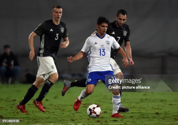 Manor Solomon of Israel action against Levin Oztunall of Germany in during the Under 21 European Qualifying Round 1. Group 5 soccer match between...