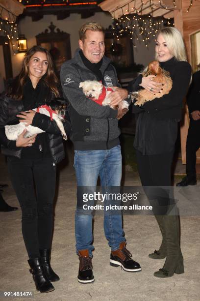 The music producer Dieter Bohlen , his partner Carina Walz and Kathrin Glock, wife of waffle producer Glock,are guests at the traditional pre-opening...