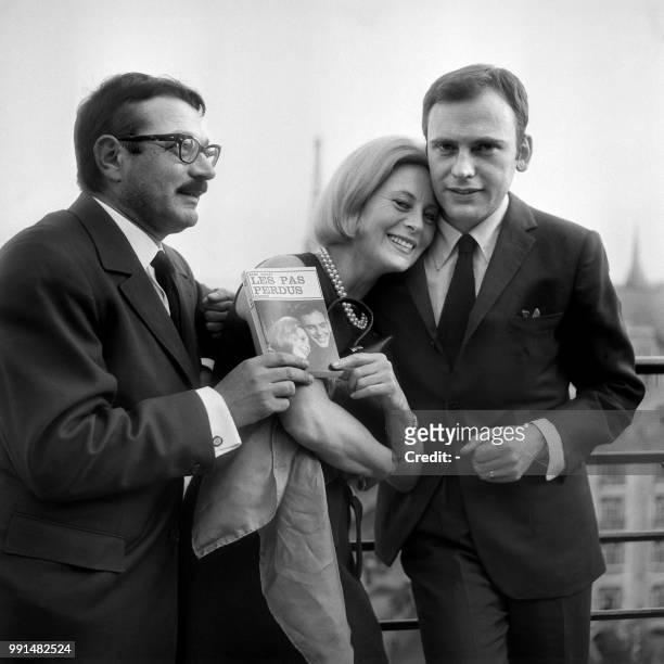 French actors Michele Morgan and Jean-Louis Trintignant pose in Paris during the preview of the film "Les pas perdus" directed by Jacques Robin from...