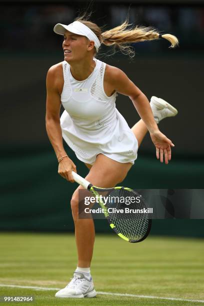 Caroline Wozniacki of Denmark in action against Ekaterina Makarova of Russia during their Ladies' Singles second round match on day three of the...