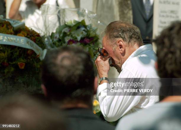 French actor Jean-Louis Trintignant , father of deceased actress Marie Trintignant burst into tears during her daughter's funeral 06 August 2003 at...