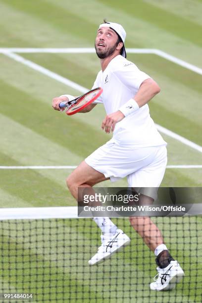 Paolo Lorenzi v Gael Monfils - Paolo Lorenzi looks up for the ball at All England Lawn Tennis and Croquet Club on July 4, 2018 in London, England.