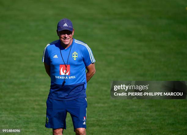 Sweden's coach Janne Andersson stands on the pitch during a training session at Spartak stadium in Gelendzhik on July 4 during the Russia 2018 World...