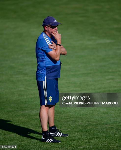 Sweden's coach Janne Andersson stands on the pitch during a training session at Spartak stadium in Gelendzhik on July 4 during the Russia 2018 World...