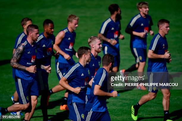 Sweden's players jog during a training session at Spartak stadium in Gelendzhik on July 4 during the Russia 2018 World Cup football tournament.