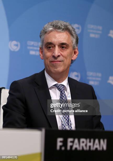 The CEO of the Deutsche Post , Frank Appel, sits on the panel next to Fiza Farhan at the World Climate Conference in Bonn, Germany, 15 November 2017....