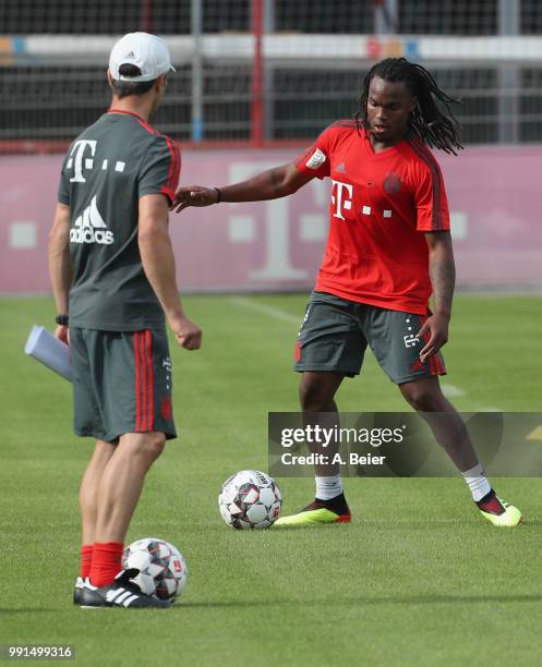 New team coach Niko Kovac of FC Bayern Muenchen looks at Renato Sanches during a training session at the club's Saebener Strasse training court on...