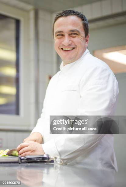 Torsten Michel, head chef of the 'Schwarzwaldstube' in the hotel Traube Tonbach can be seen in his restaurant kitchen in Baiersbronn-Tonbach,...