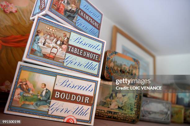 Picture taken on June 8, 2018 in Champtoceaux, western France, shows cookie boxes that are part of French collector Olivier Fruneau-Maigret's LU...