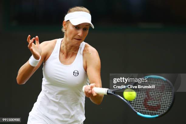 Ekaterina Makarova of Russia returns against Caroline Wozniacki of Denmark during their Ladies' Singles second round match on day three of the...