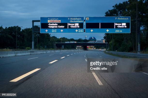 german highway a 648, exit messe, congress center - messe frankfurt stock pictures, royalty-free photos & images