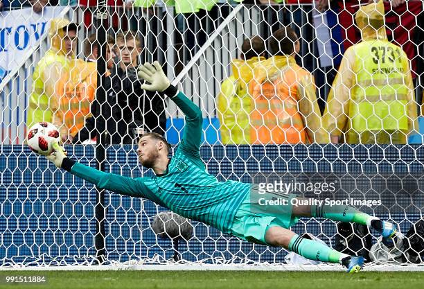 David De Gea of Spain fails to stop the penalty of Fedor Smolov of Russia during a penalty shootout as part of the 2018 FIFA World Cup Russia Round...