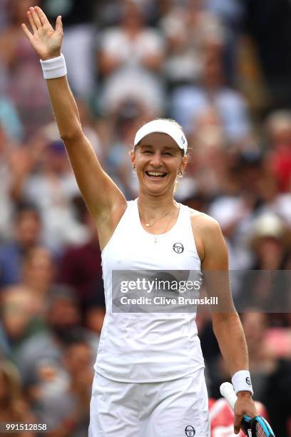 Ekaterina Makarova of Russia celebrates her victory over Caroline Wozniacki of Denmark after their Ladies' Singles second round match on day three of...