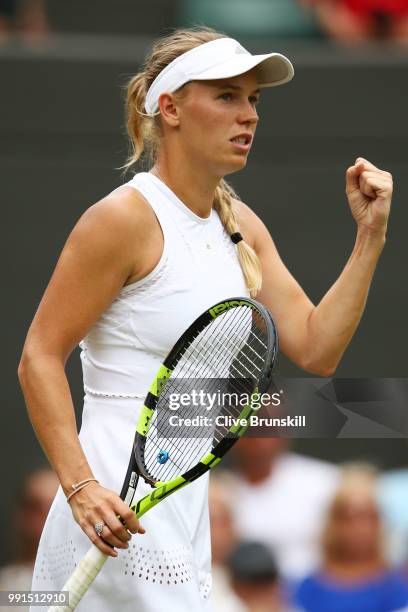 Caroline Wozniacki of Denmark celebrates a point against Ekaterina Makarova of Russia during their Ladies' Singles second round match on day three of...