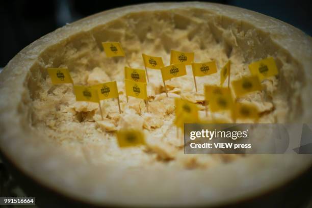 Cheese is offered for customers during The Summer Fancy Food Show at the Javits Center in the borough of Manhattan on July 02, 2018 in New York, The...