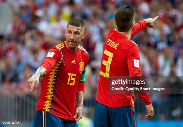 Gerard Pique and Sergio Ramos of Spain react during the 2018 FIFA World Cup Russia Round of 16 match between Spain and Russia at Luzhniki Stadium on...