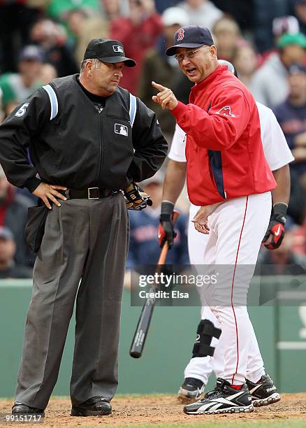 Manager Terry Francona of the Boston Red Sox argues a strik call made by home plate umpire Dale Scott in the ninth inning against the Toronto Blue...