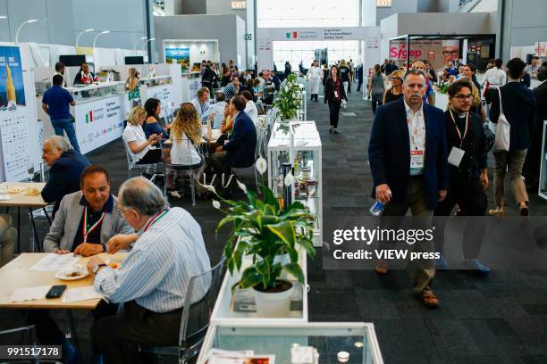 People attend The Summer Fancy Food Show at the Javits Center in the borough of Manhattan on July 02, 2018 in New York, The Summer Fancy Food Show is...