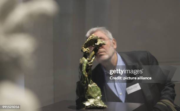 The bronze statue "Man and his Genius" at the National Gallery in Berlin, Germany, 16 November 2017. The 100th Death Anniversary of Auguste Rodin is...