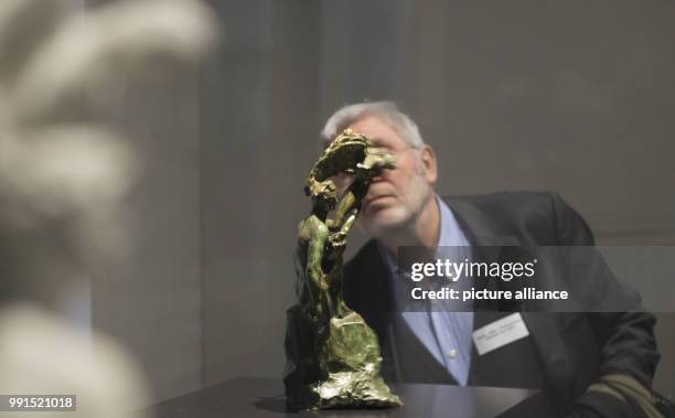 The bronze statue "Man and his Genius" at the National Gallery in Berlin, Germany, 16 November 2017. The 100th Death Anniversary of Auguste Rodin is...