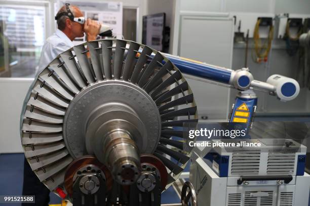 Steam turbine rotor is repaired at the Siemens workshop in Nuremberg, Germany, 22 June 2017. The Siemens AG has announced a job cut for the gas...