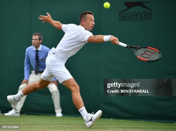 Germany's Philipp Kohlschreiber returns against Luxembourg's Gilles Muller during their men's singles second round match on the third day of the 2018...