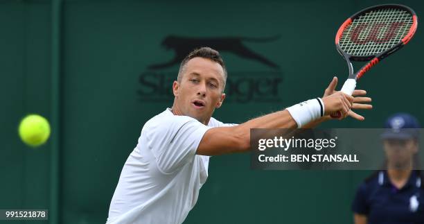 Germany's Philipp Kohlschreiber returns against Luxembourg's Gilles Muller during their men's singles second round match on the third day of the 2018...