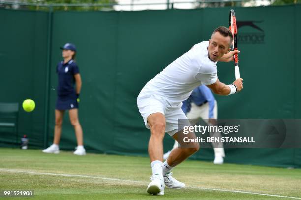 Germany's Philipp Kohlschreiber returns against Luxembourg's Gilles Muller during their men's singles second round match on the third day of the 2018...