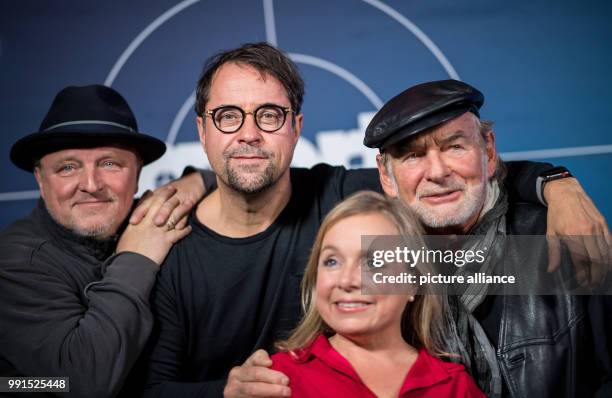 The actors Axel Prahl , Jan Josef Liefers, Christine Urspruch and Claus D. Clausnitzer can be seen at the cinematic premiere of the "Tatort Muenster"...