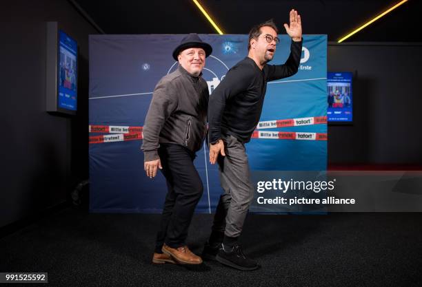 The actors Axel Prahl and Jan Josef Liefers can be seen at the cinematic premiere of the "Tatort Muenster" at the Cineplex in Muenster, Germany, 16...