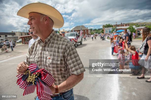 Montana's Republican Congressman Greg Gianforte campaigns at the Livingston Roundup Rodeo parade on July 2, 2018 in Livingston, Montana. Gianforte...