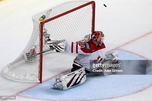 Goalkeeper Chris Mason of Canada makes a save during the IIHF World Championship group C match between Canada and Switzerland at SAP Arena on May 12,...