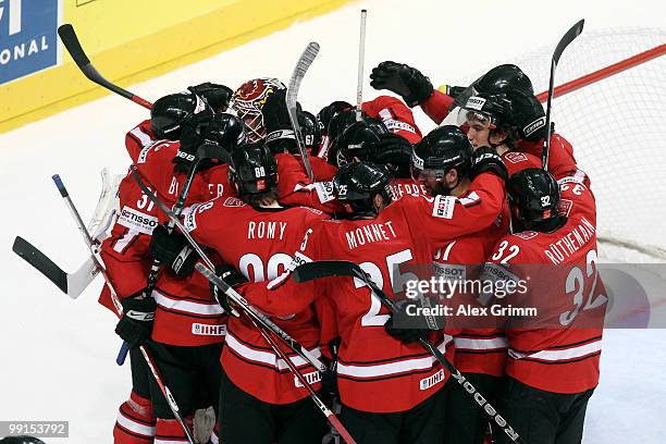 Players of Switzerland celebrate after winning the IIHF World Championship group C match between Canada and Switzerland at SAP Arena on May 12, 2010...