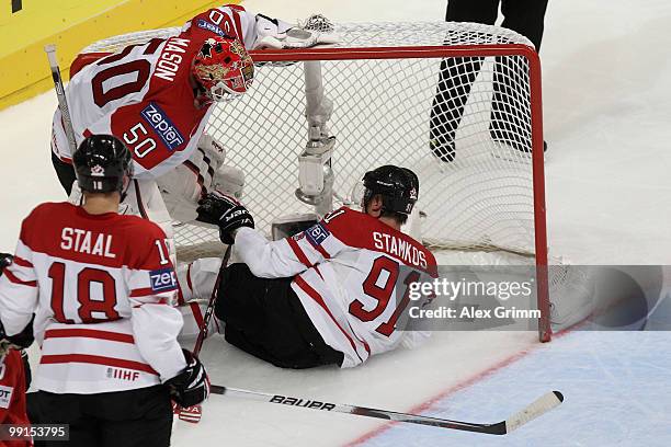 Marc Staal, goalkeeper Chris Mason and Steve Stamkos of Canada react during the IIHF World Championship group C match between Canada and Switzerland...