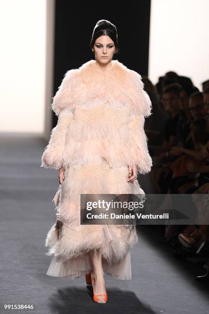 Vittoria Ceretti walks the runway during the Fendi Haute Couture Fall Winter 2018/2019 show as part of Paris Fashion Week - on July 4, 2018 in Paris,...