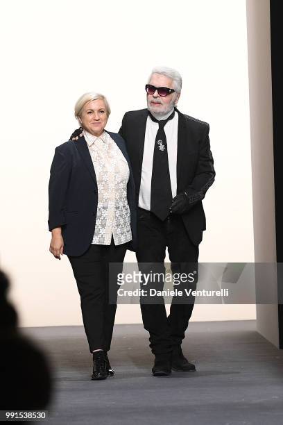 Designer Karl Lagerfeld and Silvia Venturini Fendi acknowledging the applause of the public after the Fendi Haute Couture Fall Winter 2018/2019 show...